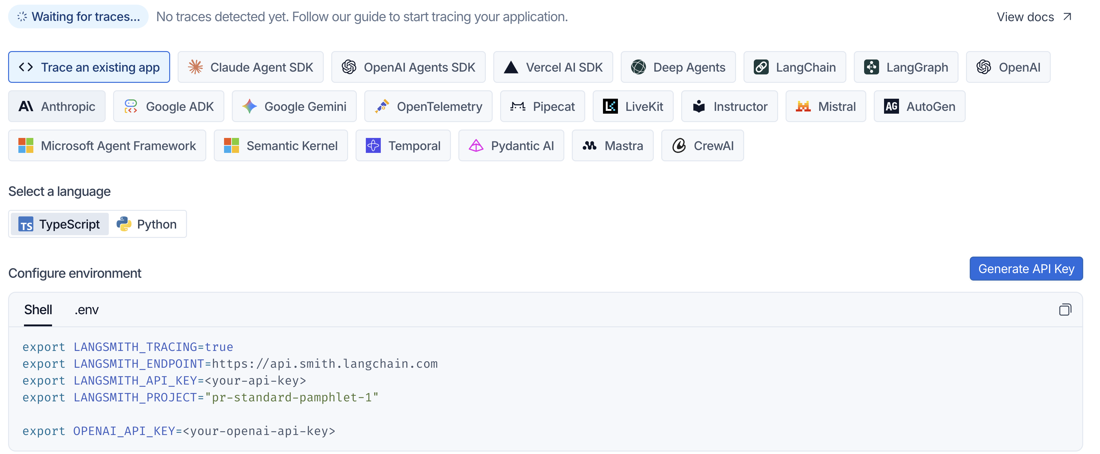LangSmith setup screen — waiting for traces, framework picker, language selector, and the LANGSMITH_* environment variables